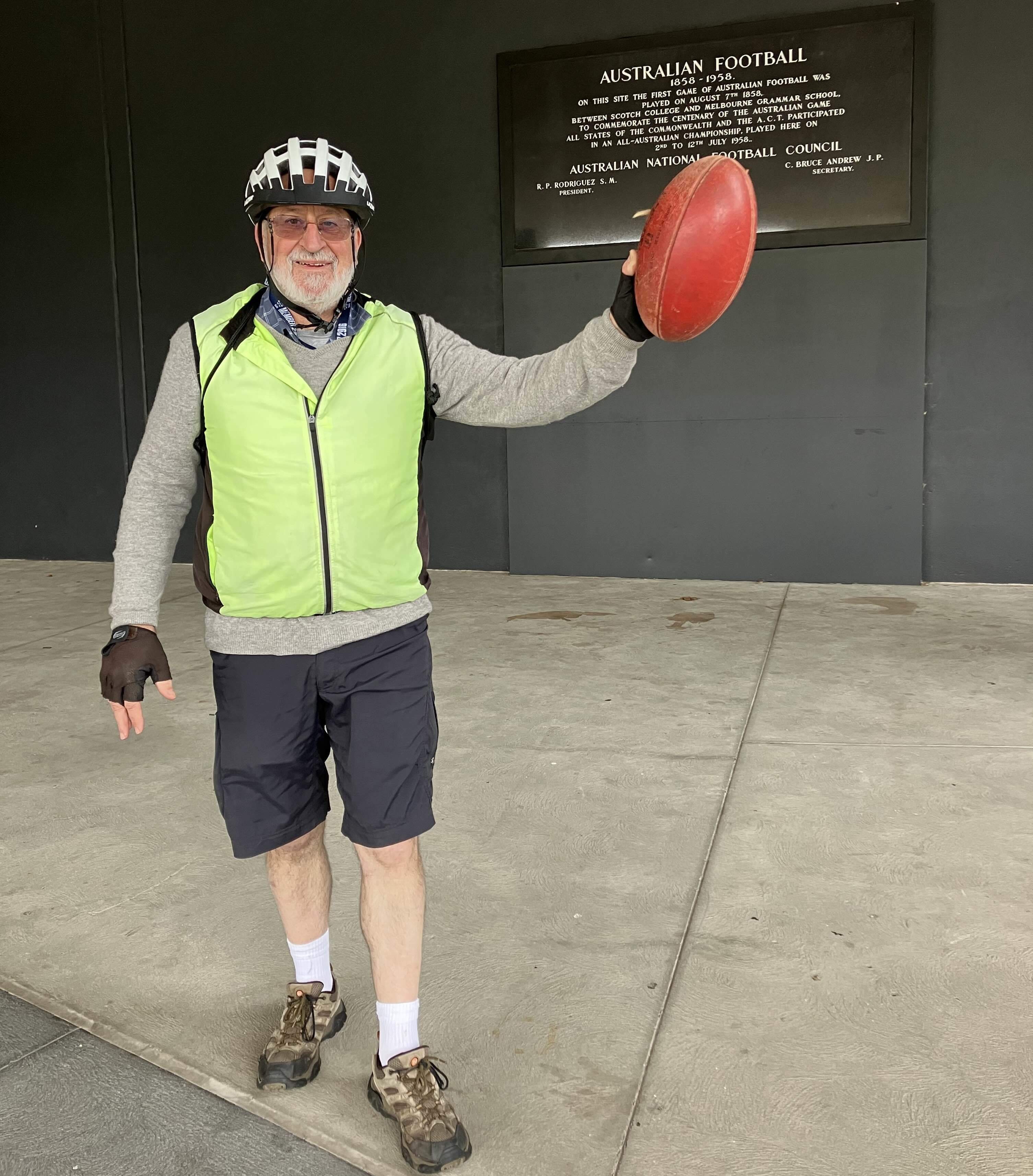 AU Melbourne by Bike Guide Geoff loves Aussie Rules Travel Essence