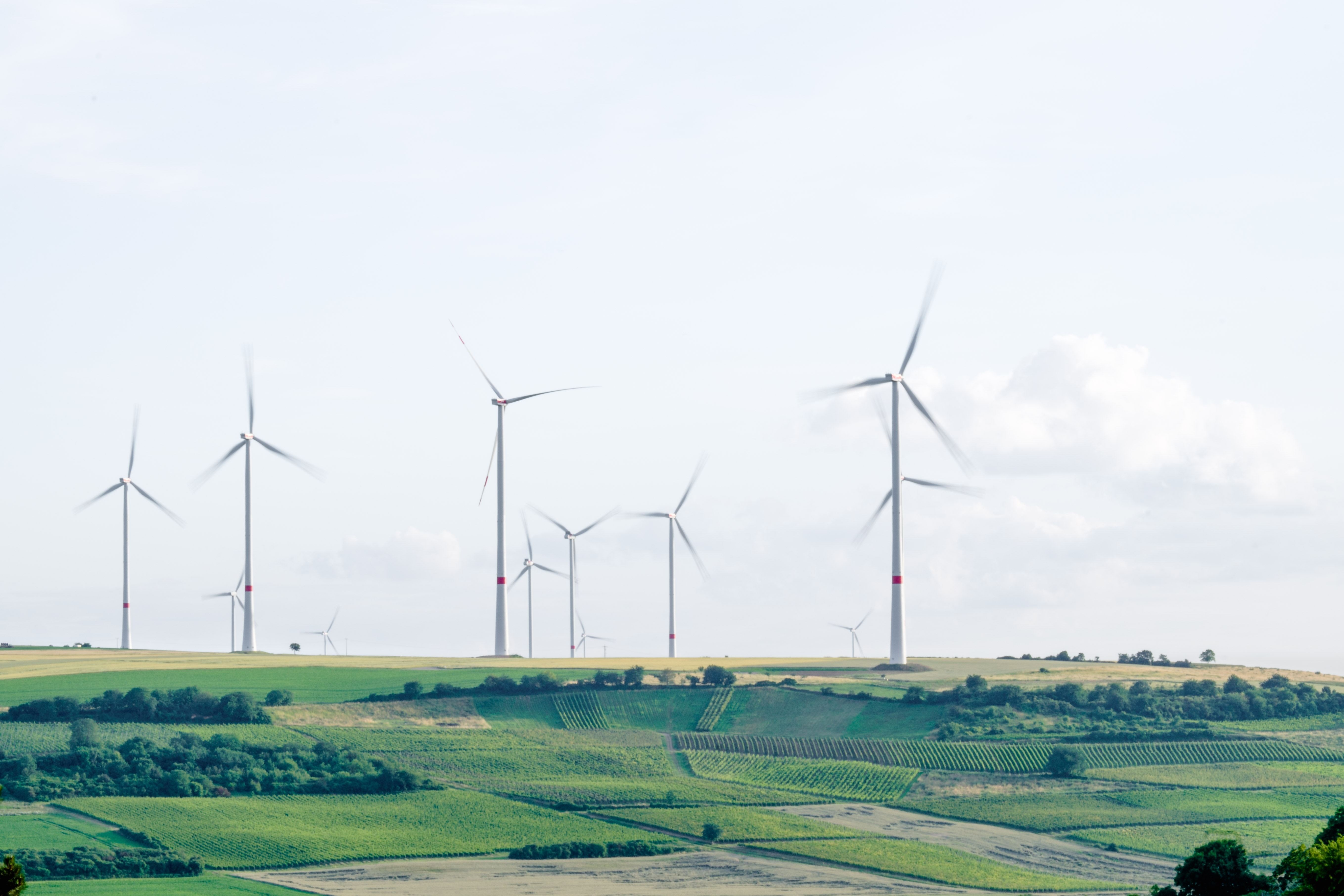 Sustainable travel wind turbine karsten wurth unsplash