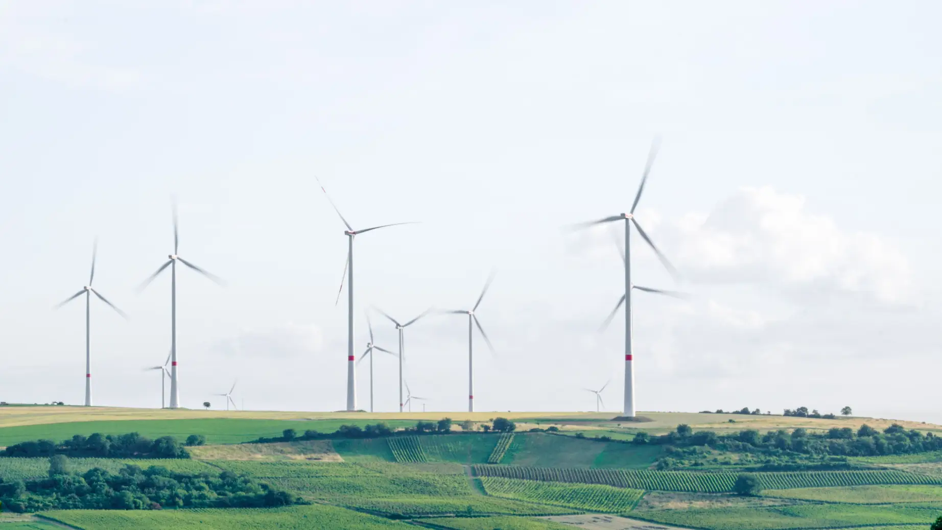 Sustainable travel wind turbine karsten wurth unsplash