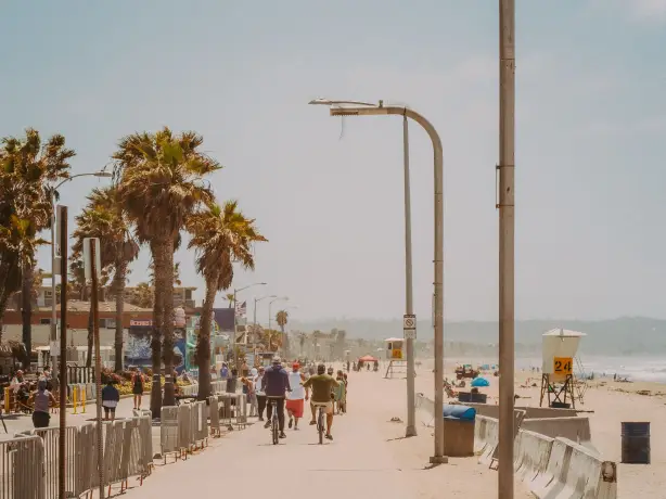 Cyclists and walkers travel along the back of Pacific Beach in San Diego