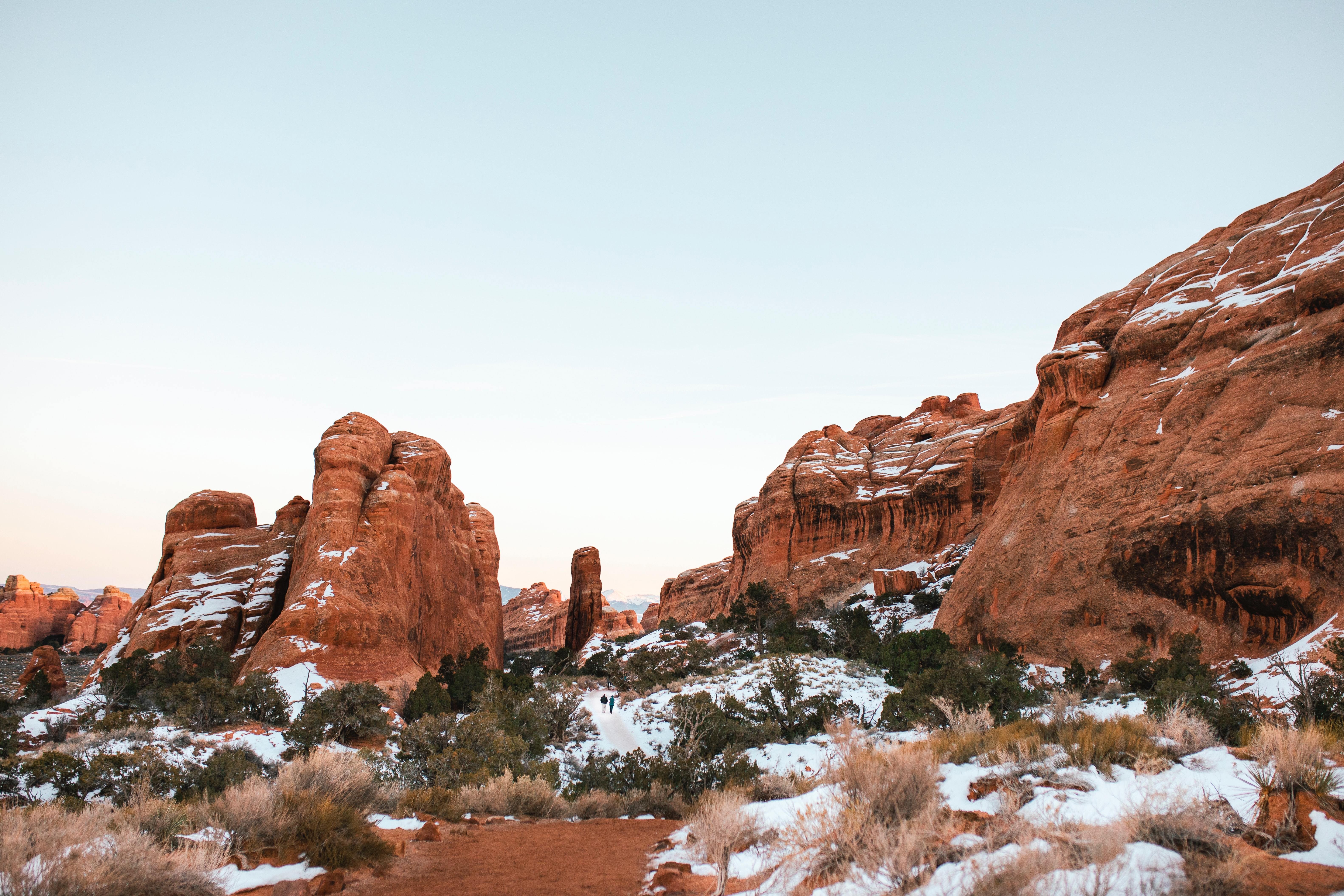 People walking through Arches National Park in Utah during winter