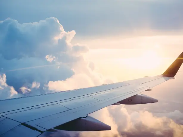 Travel airplane wing Ross parmly unsplash
