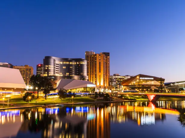 South Australia – Adelaide’s skyline at night, with lights reflecting on the water