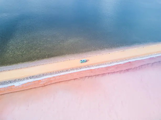 Van driving along Lake Macdonnell, Eyre Penninsula, SA