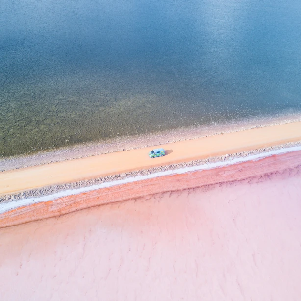 Van driving along Lake Macdonnell, Eyre Penninsula, SA