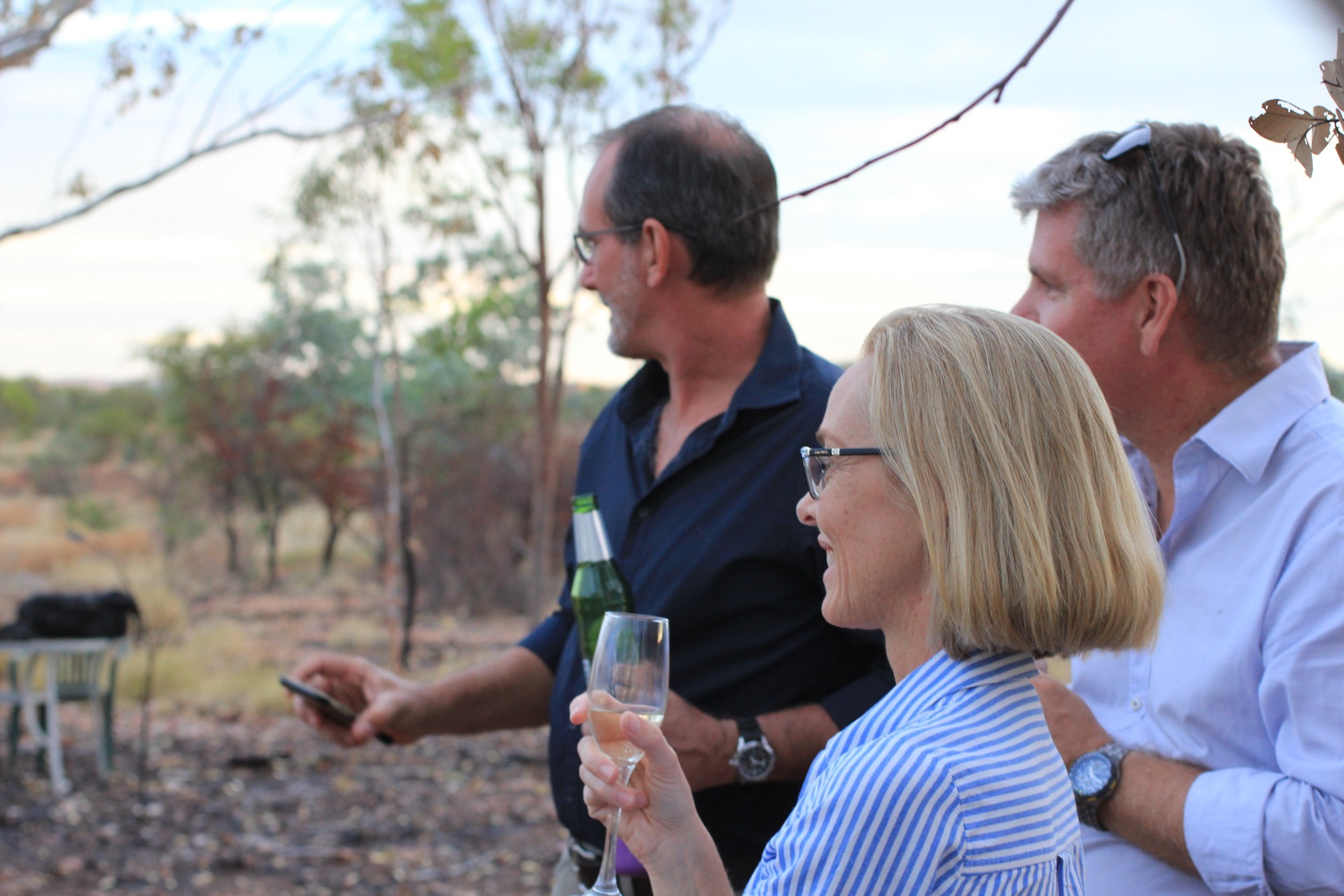 A group of people enjoy a drink in the Bungle Bungles, Australia