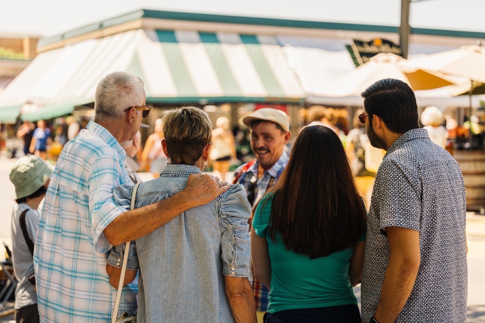 A local guide takes tourists on a walking tour of Montreal