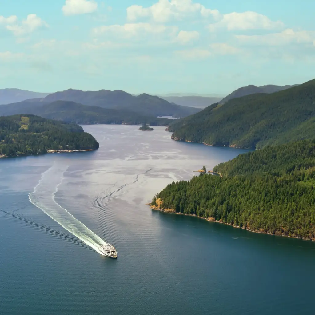 Aerial view over sunshine coast, boat on the water