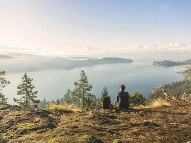 woman looking out at the scenic view, sunshine coast, canada