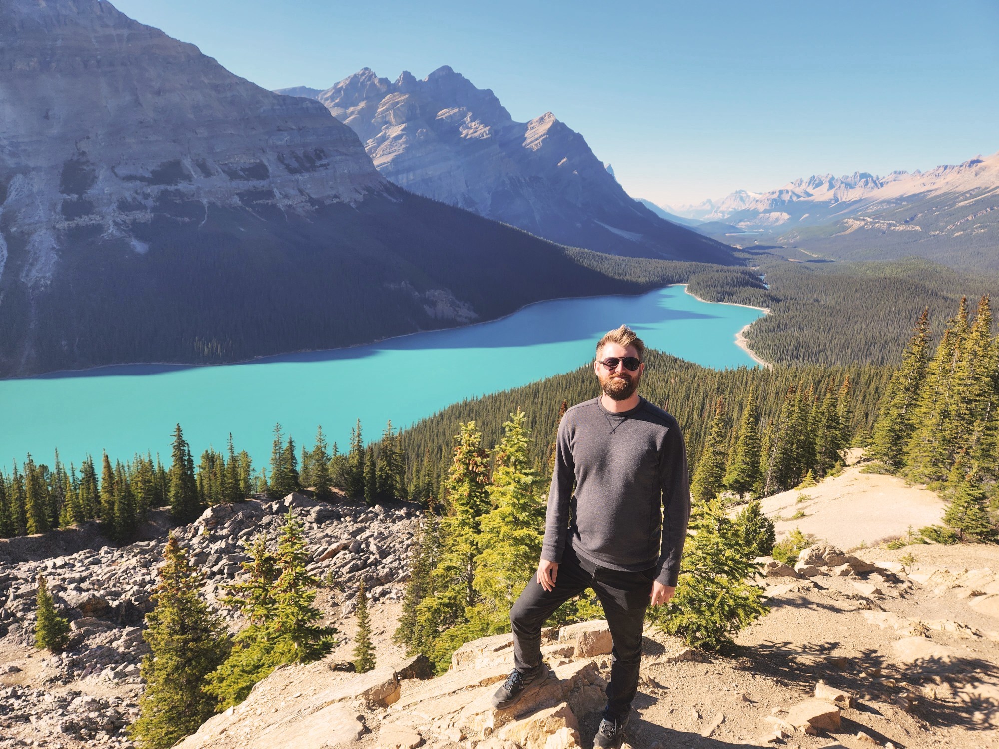 Luke Northeast with glacial lake, mountains and forest behind