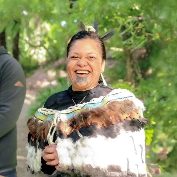 Local hosts smiling at the camera