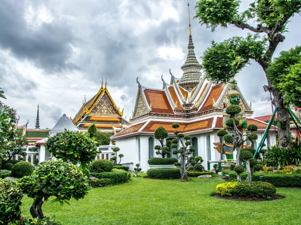 Traditional temple in Bangkok with surrounding garden