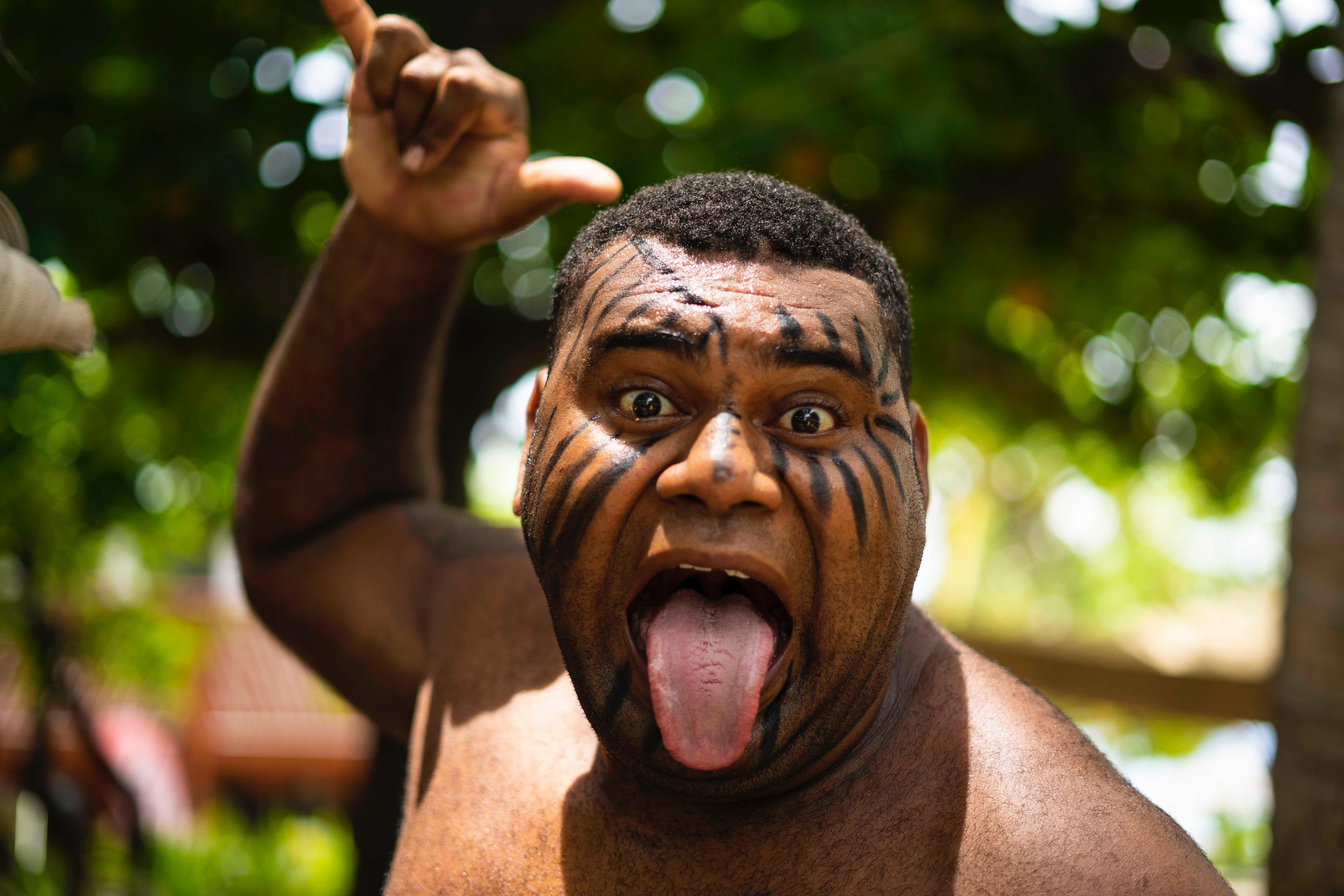 A local man with traditional face paint