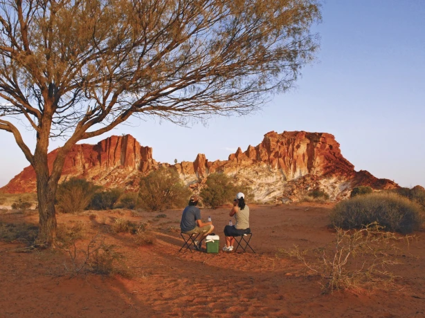 A couple having a picknick in the Australian outback