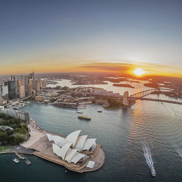 An aerial view of Sydney Harbour at sunset