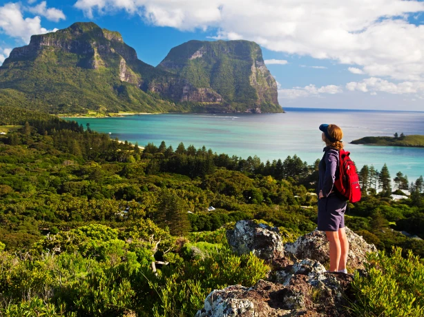 Hiker admiring the view of the mountains on Capella Lord Howe Island