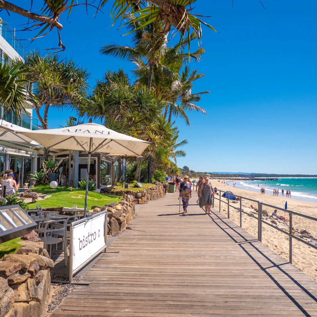 Walking stretch along the noosa beach