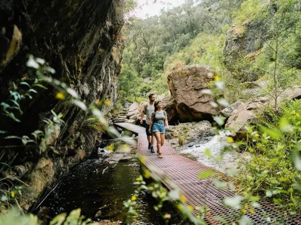 Couple walking along boardwalk in Grampians National Park