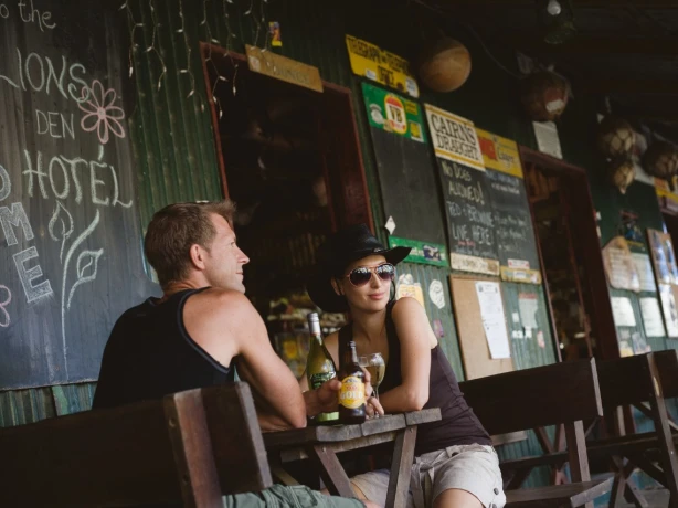 Couple sitting in a pub in Australia