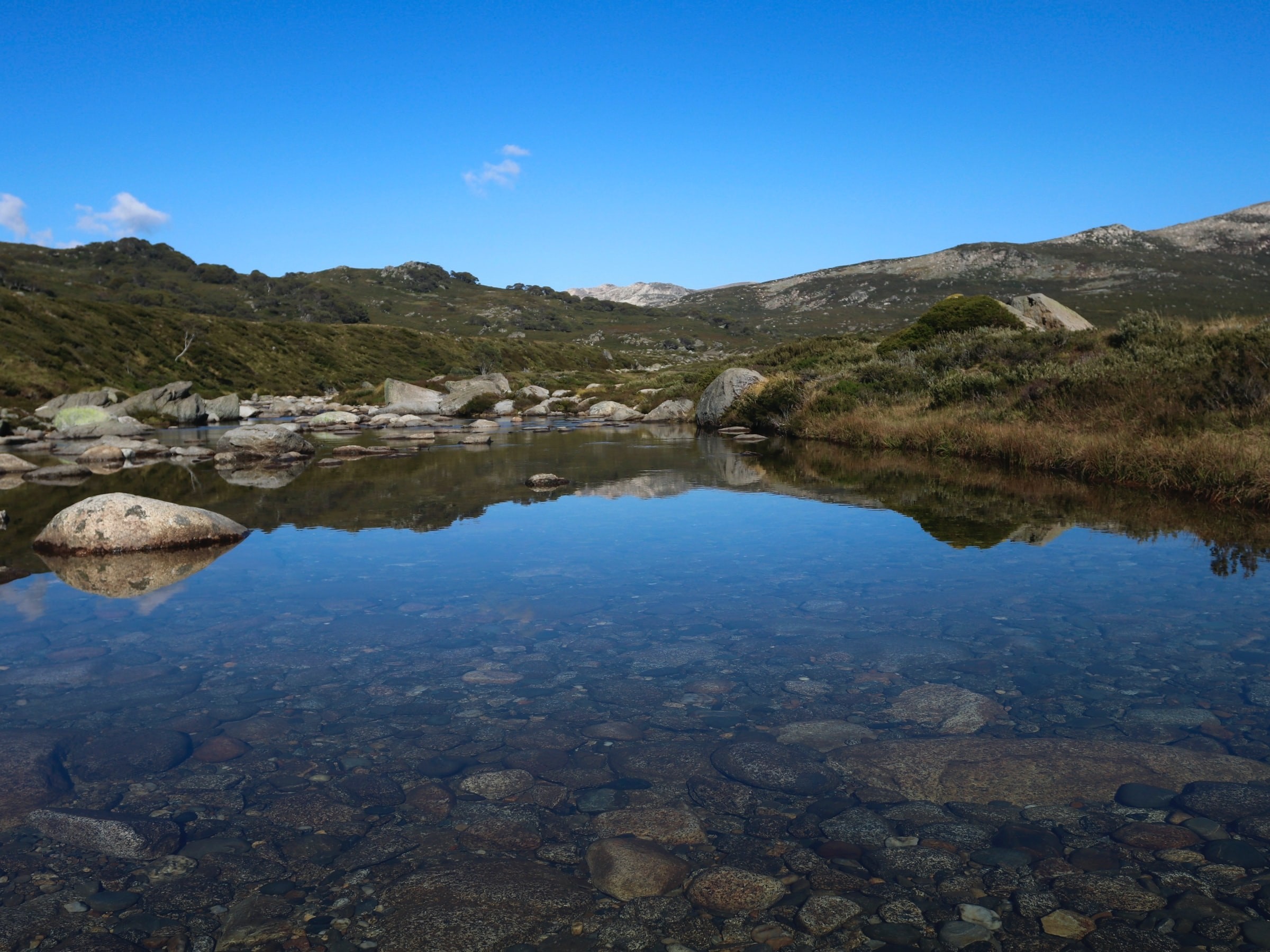 A Us nsw mount kosciuszko national park rock pool christian bass unsplash