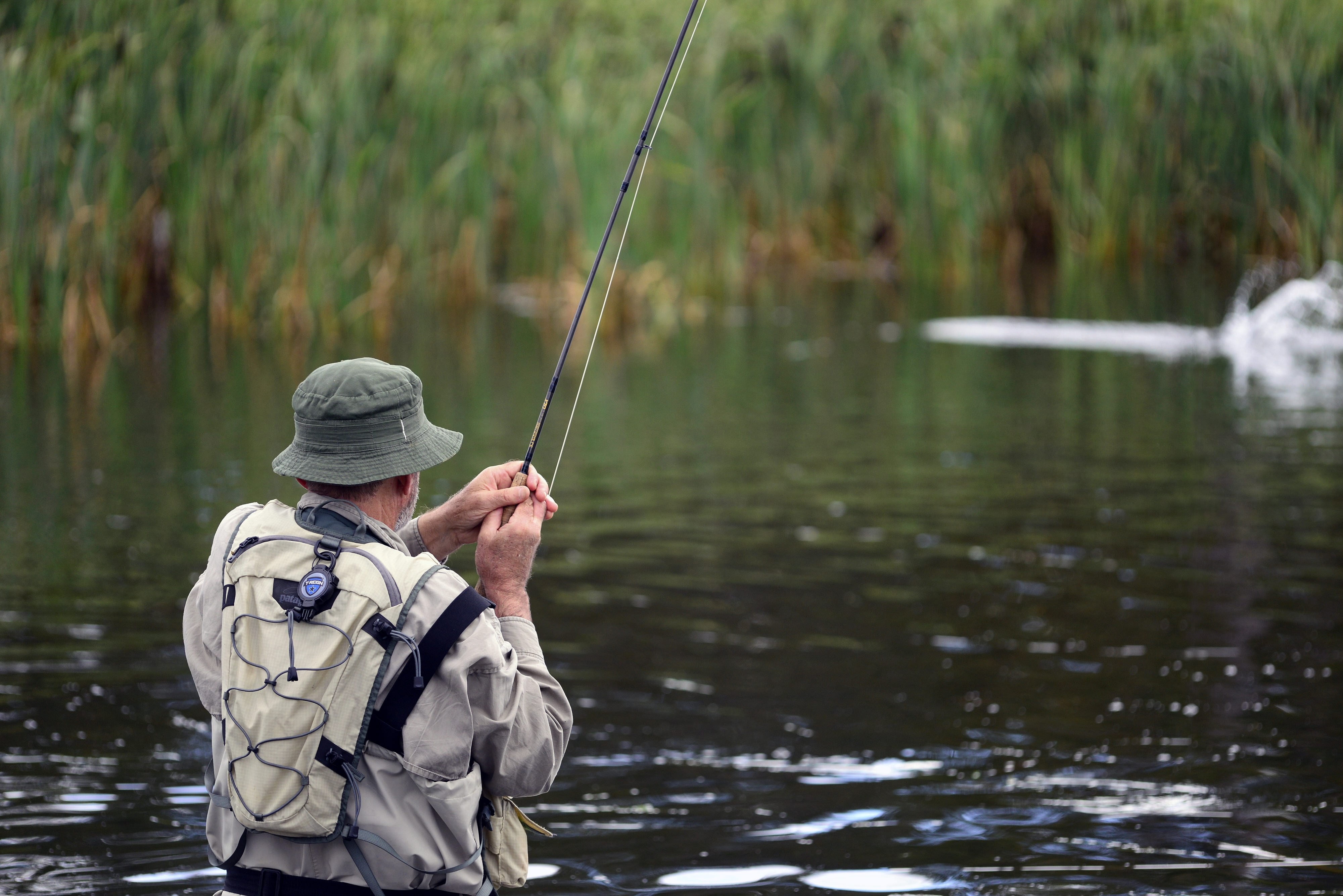 Au tasmania fishing retreat action shot friends stays comfortable