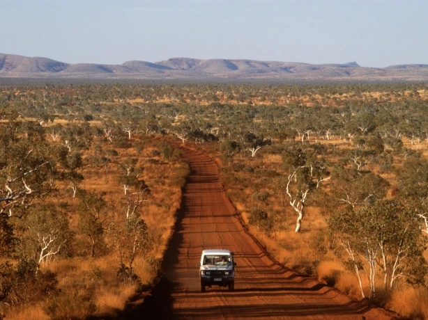 Jeep driving through the Australian Outback.