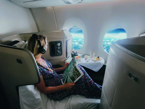 Au business class flying solo flights