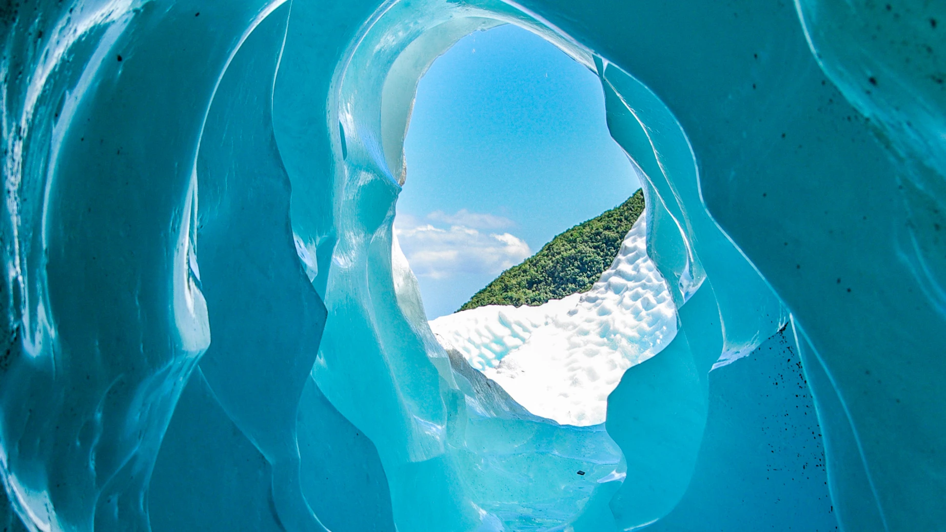 A look through an ice tunnel on the Franz Josef Glacier in New Zealand