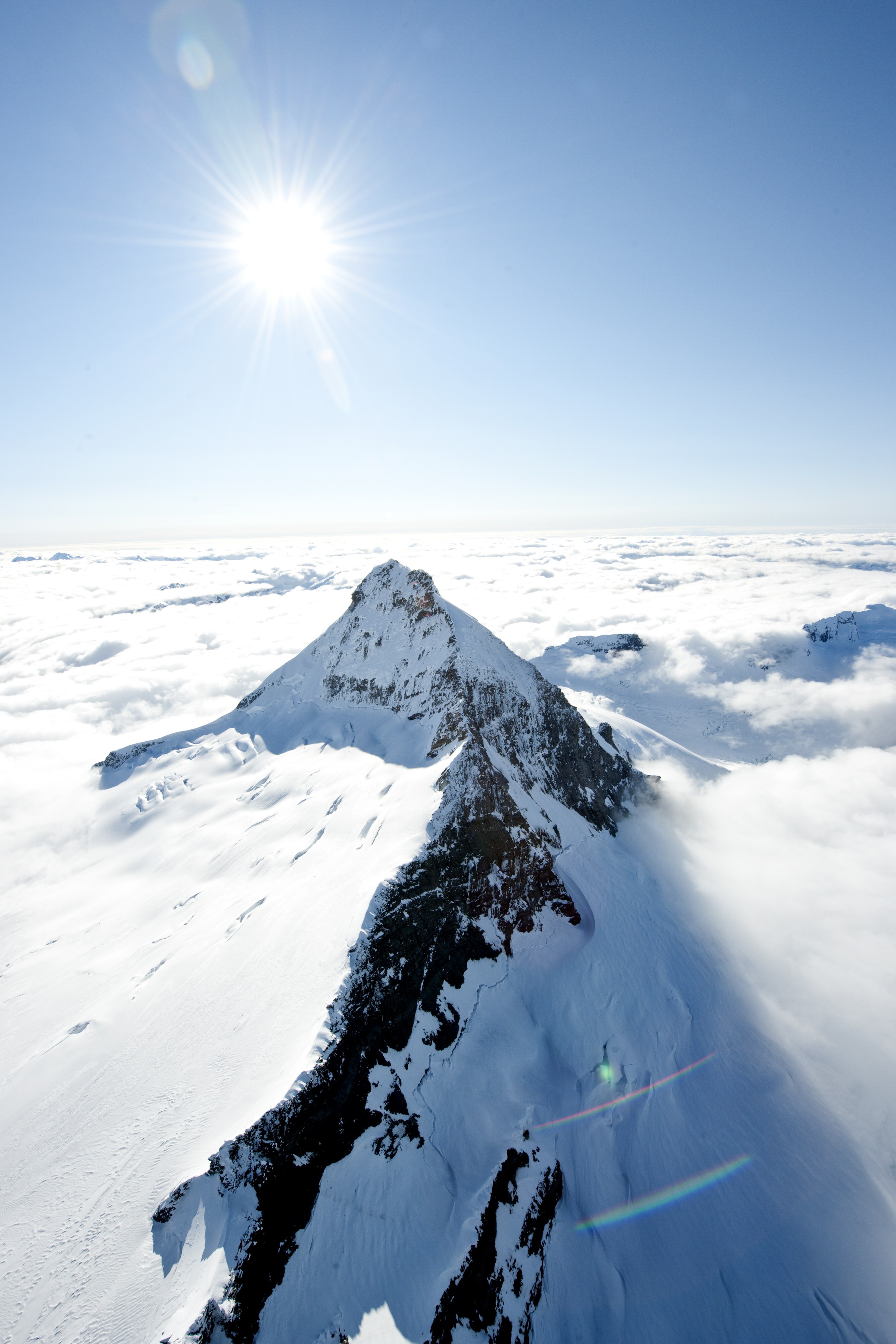 Nz mount cook sunshine clouds jimmy nelson discoverpage national parks