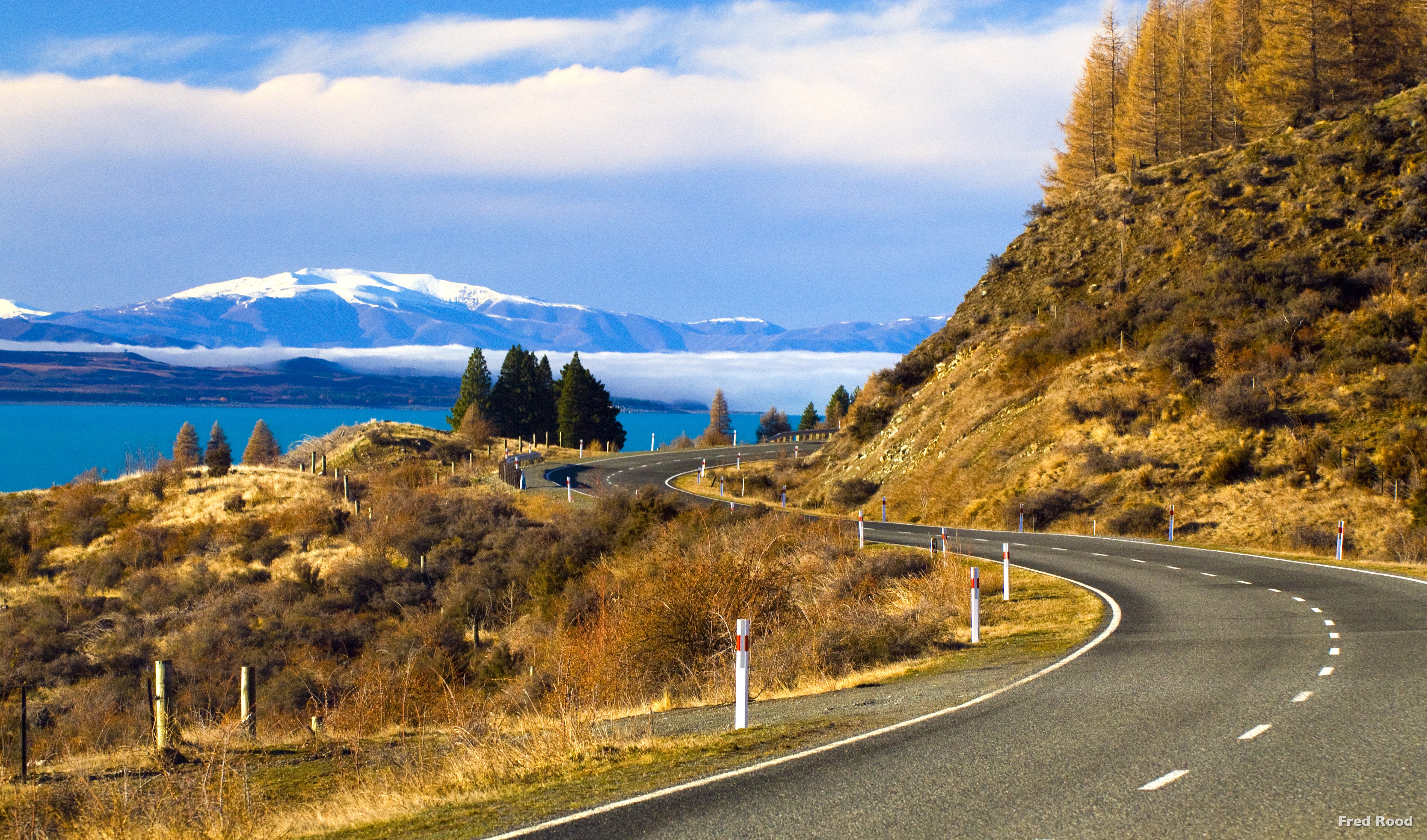 A winding road leading to Mount Cook National Park in New Zealand