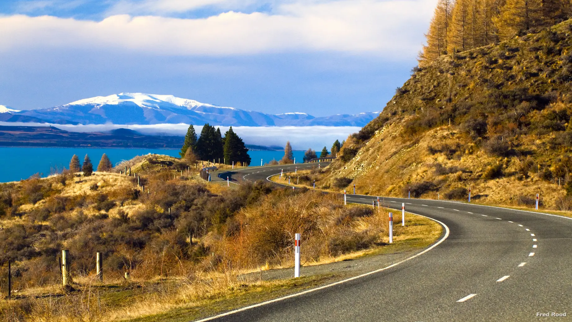 A winding road leading to Mount Cook National Park in New Zealand