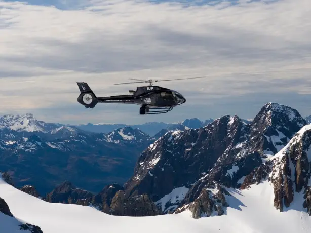 Helicopter flying above Mount Aspiring