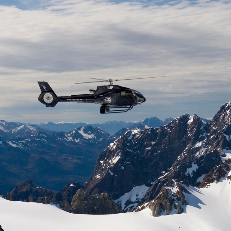 Helicopter flying above Mount Aspiring