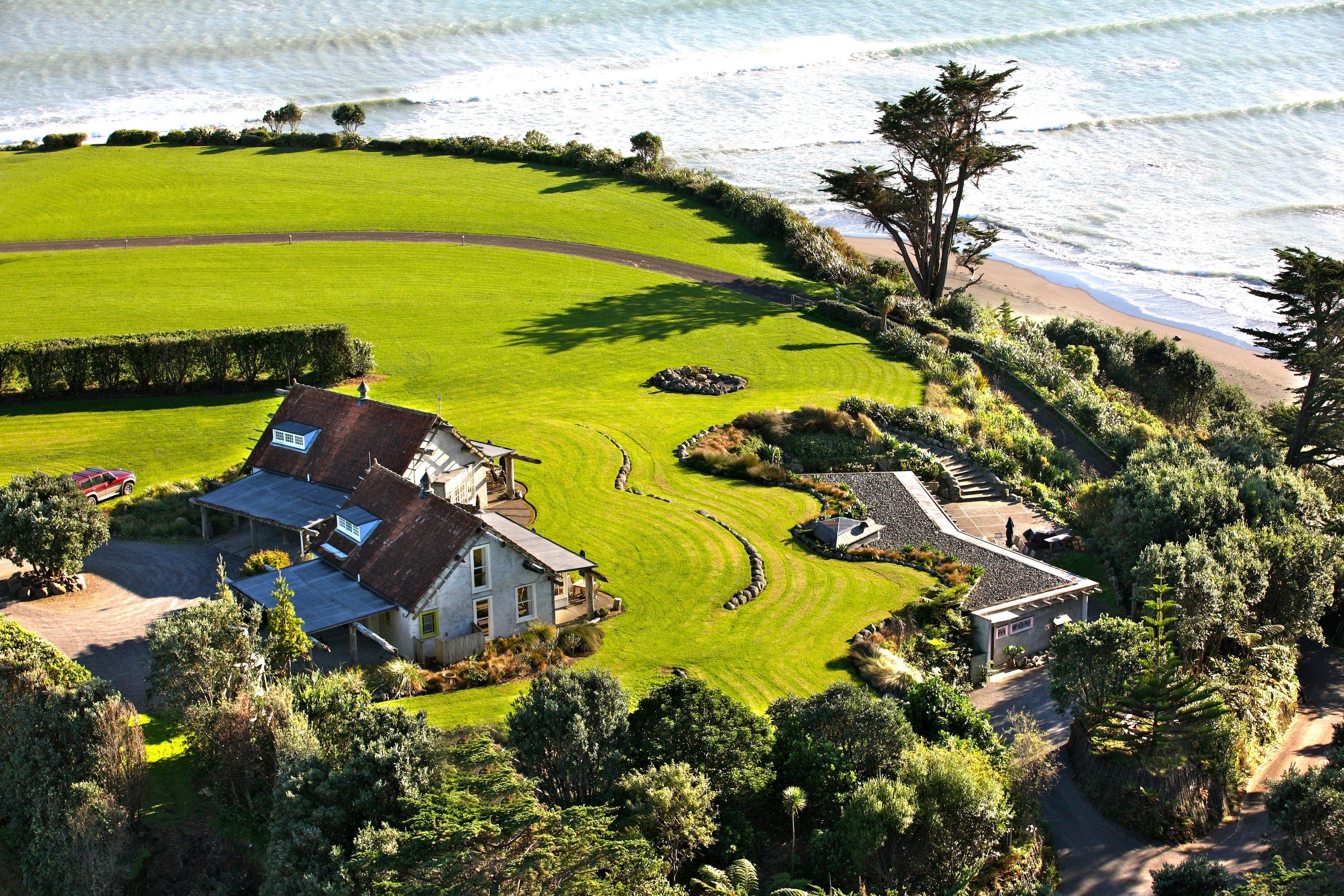 Nz taranaki ahu ahu beach villas aerial family very comfortable