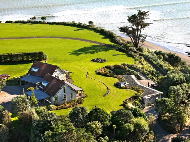 Nz taranaki ahu ahu beach villas aerial family very comfortable