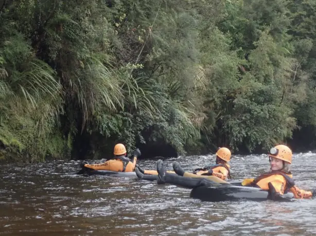 Nz paparoa national park tube river group friends see and do adventurous
