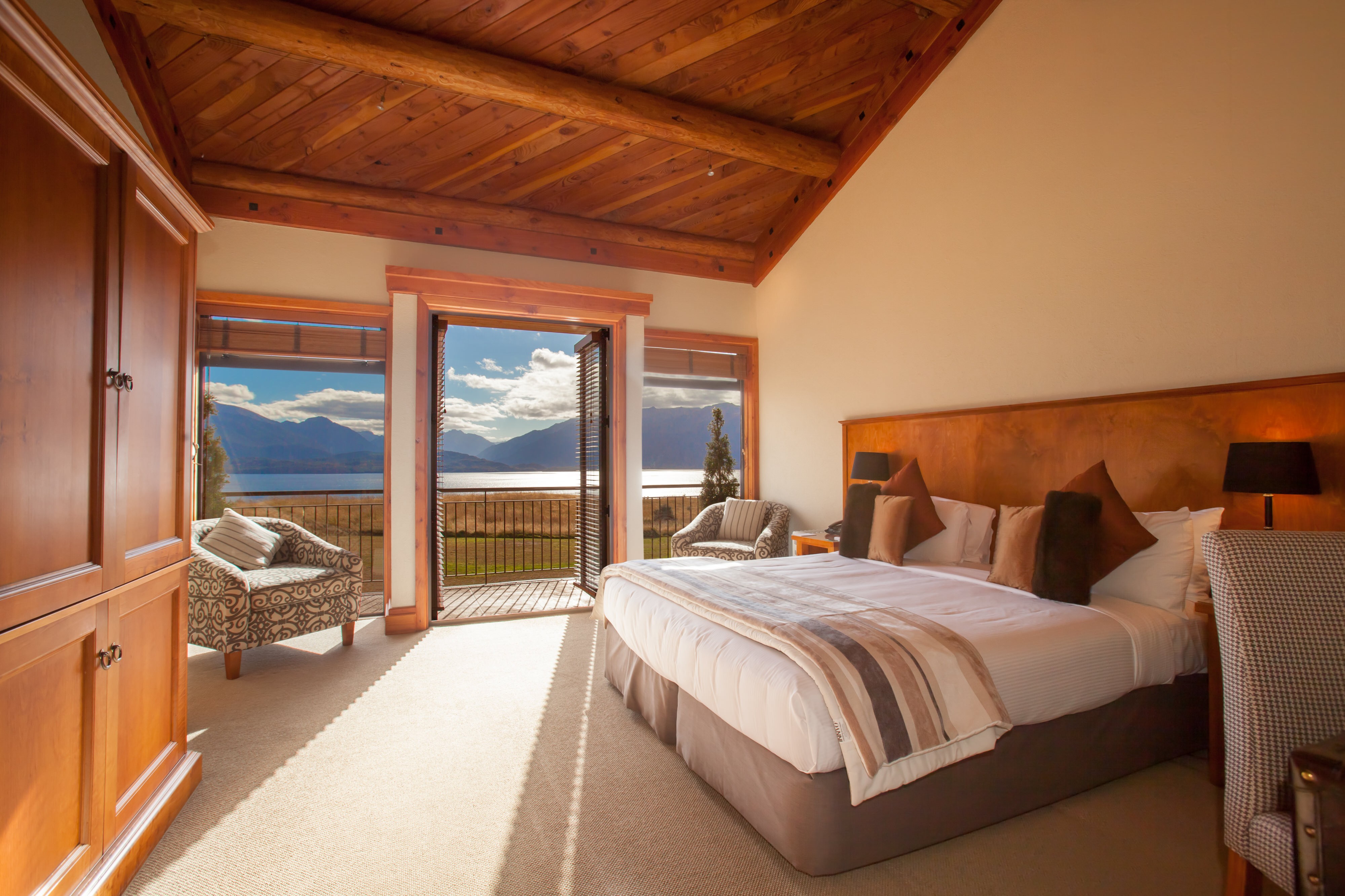 Nz fiordland lodge bedroom view solo stays luxury
