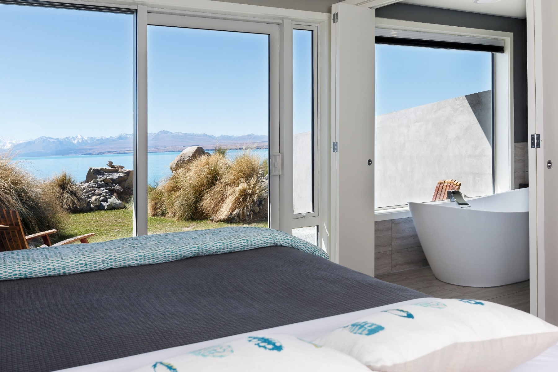 Nz lake pukaki lodge bedroom mountain view solo stays luxury
