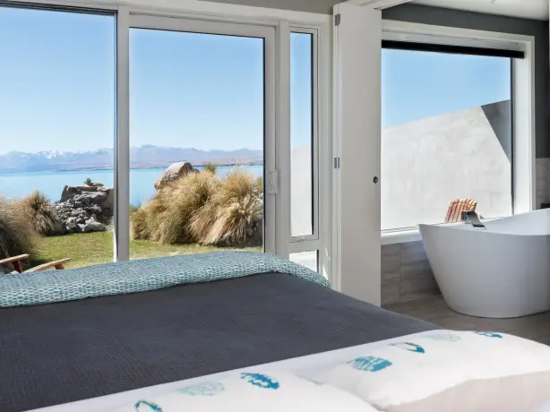 Nz lake pukaki lodge bedroom mountain view solo stays luxury