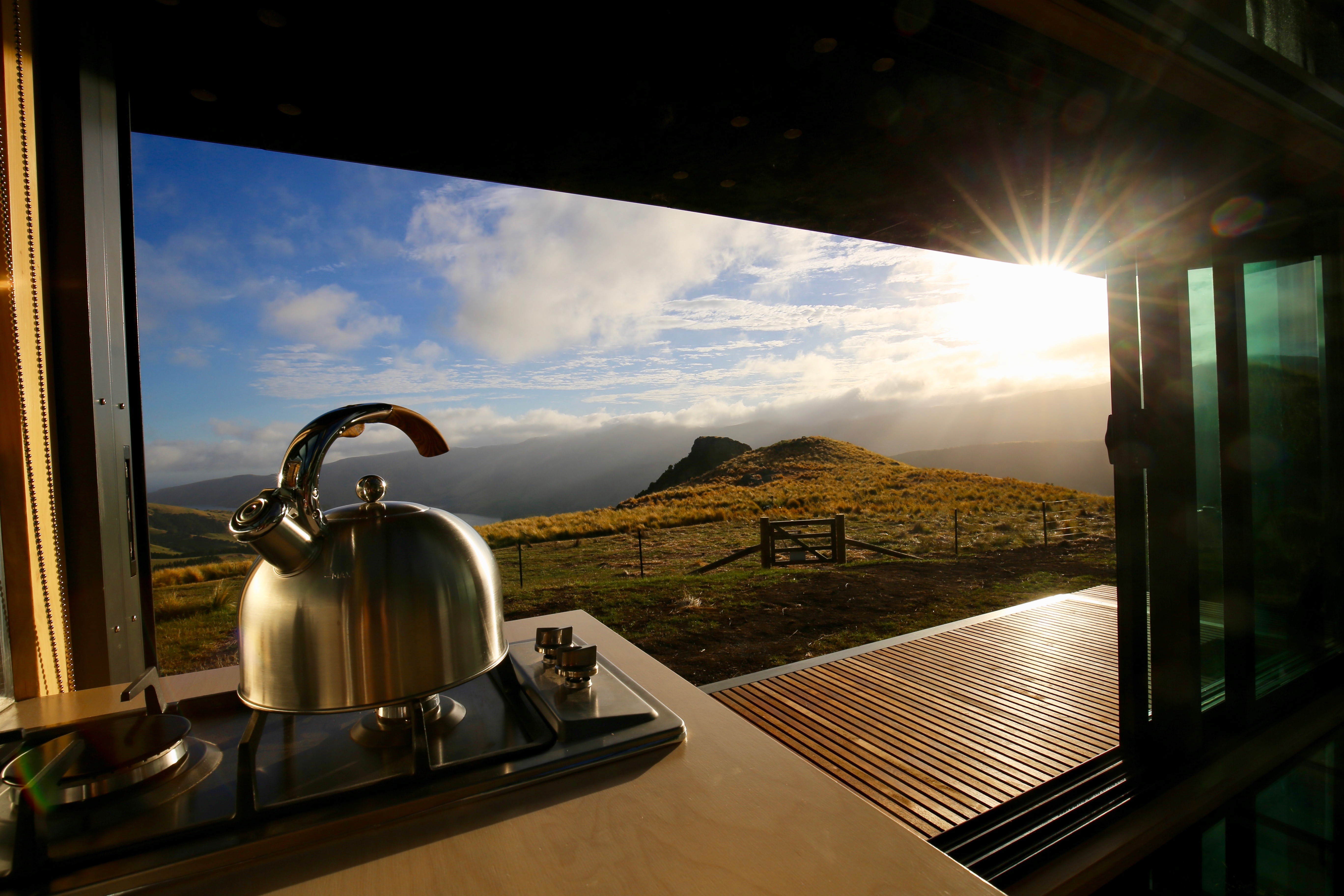 nz-banks-peninsula-pod-kitchen-view-nature-partner-accommodation-luxury