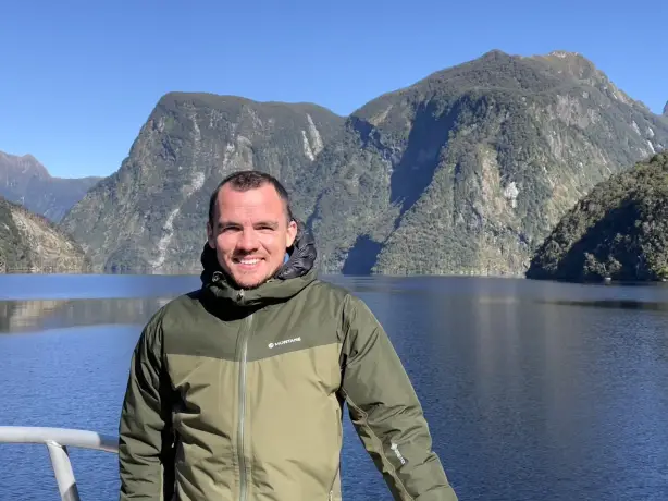 TravelEssence specialist Kieran on a boat trip in Doubtful Sound, New Zealand