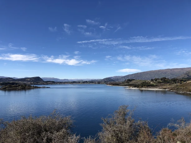 overlooking lake wanaka with mountains and hills in the background